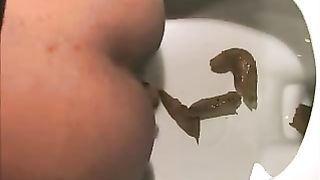 Pretty ebony girl pooping