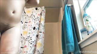 Brunette girl showing her hairy pussy and fresh poop