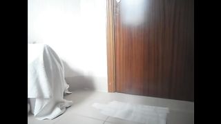 Slim shaved pussy girl poops into a plastic cup