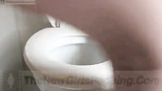 Big girl pooping small load in the toilet