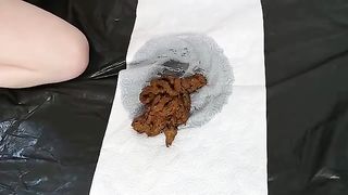 Brunette teen spread legs and pooping heavily