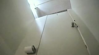 Sexy Asian girl pissing and pooping in the toilet