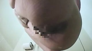 Sexy Asian girl pissing and pooping in the toilet