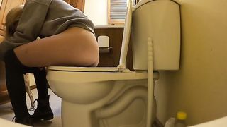 Sweet blonde teen with sexy ass pooping in the toilet