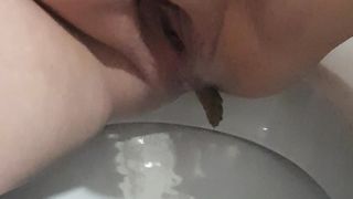 BBW wife pooping in closeup