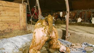Wicked Betty masturbates in the manure
