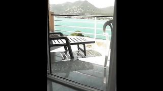 Pretty lady pooping in the hotel's balcony