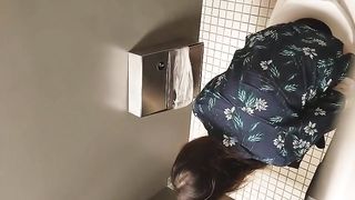 Amateur brunette girl caught pooping with spycam