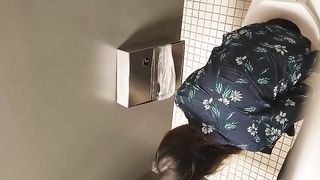 Amateur brunette girl caught pooping with spycam
