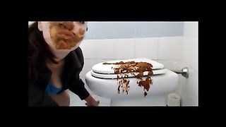 Brunette shitting on the cover of toilet cover