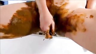 Girl shitting and masturbating with shitty dildo in solo
