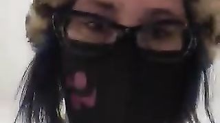 Mature masked lady pooping show