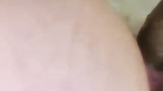 Horny looking MILF poops thick load