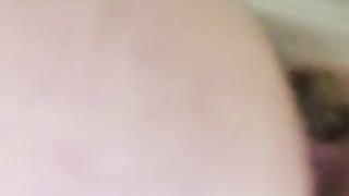 Horny looking MILF poops thick load