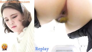 Beautiful girl in knee high boots pooping