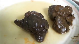 Chick drops two hard dark chunks