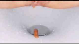 Amateur Asian lady pooping in the toilet