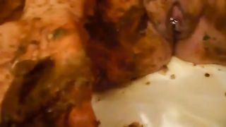 Mature whore eating and smearing shit