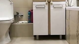 Stunning girlfriend in stockings poops in the bathroom