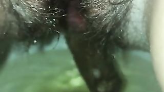Hairy lady piss and poop closeup