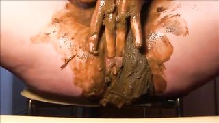 Woman shitting in her panty before rubbing and masturbating