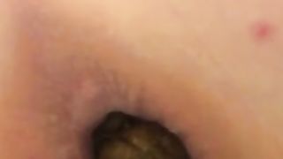 Girl shit and piss in closeup