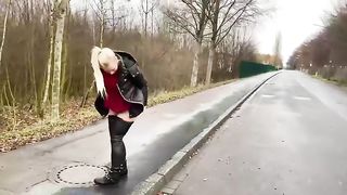 Naughty blonde slut pooping on the road