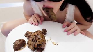 Sexy masked scat slut eating turd cookies
