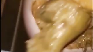 Messy wet poop in closeup