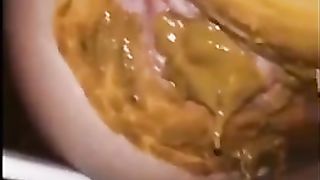 Messy wet poop in closeup