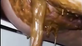 Messy wet poop in closeup