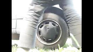Amateur lady pooping and pissing near the car outdoor