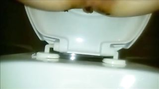 Yellowish messy poop in the toilet