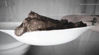 Gothic slut eating her own waste