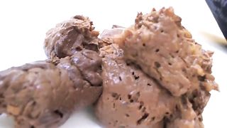 Brunette beauty takes a steaming shit in a plate