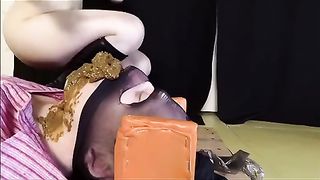 Thick slut pisses on a box she is sitting on