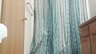 Cutie in a black dress pooping closeup