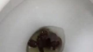 Gorgeous curly haired ebony poops in toilet