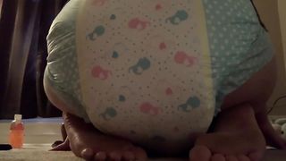 Girl poops in her diaper at home