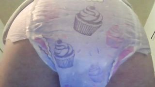 Pooping good in her diaper