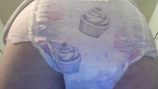 Pooping good in her diaper