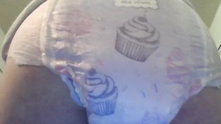 Pooping good in her diaper