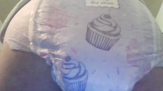 Pooping good in her diaper