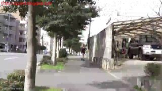 Lady pooping in front of her house