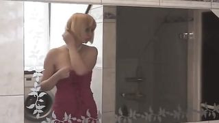 Blonde short haired lady playing with her messy load