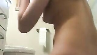 Cute teeny girlfriend smearing shit on her lovely body