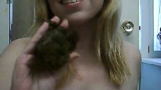 Playing with her sticky shit