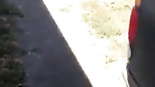 Chunky lady poops behind the car