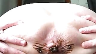 Mature lady teasing and pooping closeup