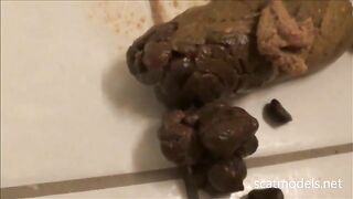 Cute girl masturbates and poops on the floor